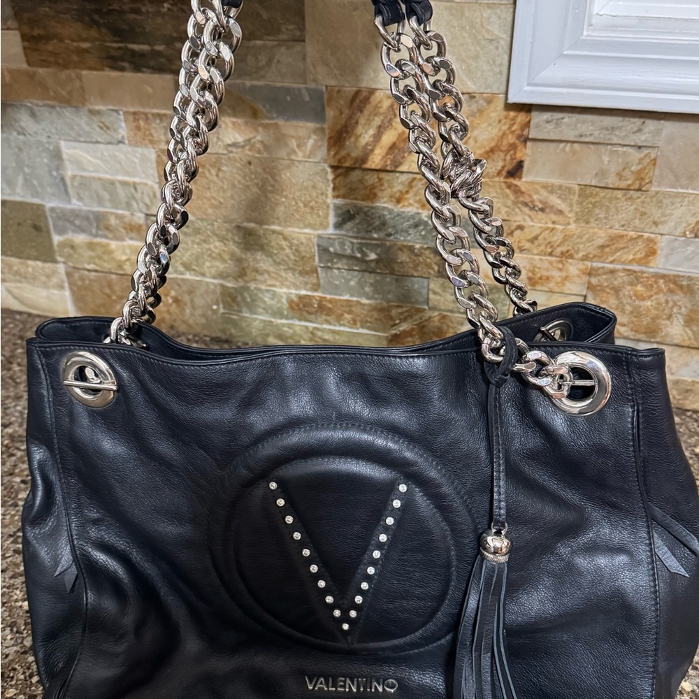 Authentic VALENTINO Verra black leather handbag.